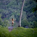Pic of Clover playing nude on a swing in Ubud Bali