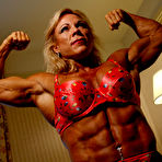 Pic of Topless middle-aged bodybuilder Lauren Powers shows off her hard muscles and big tits