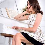 Pic of Adel Morel feels better without any clothes while next to her piano
