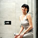Pic of Petite Nimfa stripteases in the bathroom - Anilos Porn Pics