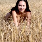 Pic of Busty farmgirl Helga posing naked in the field