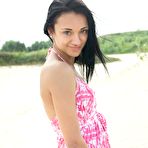 Pic of Gorgeous teen Aprilia B is performing the turning on nude pussy posing on the beach