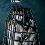 Pic of SexPreviews - Sasha long hair stockings submissive is bound in metal cage her pussy toyed to orgasms