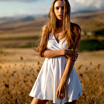 Pic of Alina in a White Dress Outside