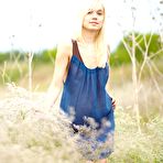 Pic of Blonde girl Aljena A takes off her dress and fools around in the blossoming meadow