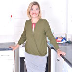 Pic of Naughty British housewife getting wet in her kitchen