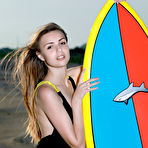 Pic of Elle Tan Loves to Surf