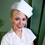 Pic of Tied nurse Samantha Sin takes Mark Davis cock deep in her throat and ass