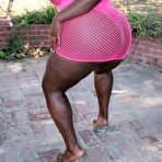 Pic of Black fattie Chyna White PlumperPass poses in pink fishnet dress and gets slammed