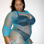 Pic of Black BBW Crystal Clear has interracial sex after removing her blue fishnet dress and black undies