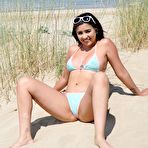 Pic of BikiniFanatics - Latina bikini model shows her pierced nipples in public