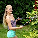 Pic of Skinny Blonde Ass Toys While Gardening