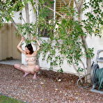 Pic of Helpless slave girl Nadin with tight smooth pussy is tied in the backyard