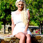 Pic of Lycia Sharyl strips out of her cute little white dress