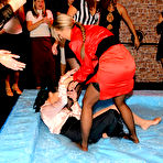 Pic of Christina Lee, Mila Dark and two more clothed women take part in oil fight at the party