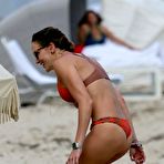 Pic of Katie Cassidy in red bikini on a beach
