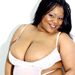 Pic of Plump ebony woman Jada Juggs poses in white lingerie and sucks black cock