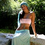 Pic of Latin Chick Isobel Riveira Lifting Her Long Skirt Up Demonstrating Hot Slit And Nasty Posing Outdoor. / DefineBabe.com