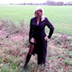 Pic of British Milf Barby opening her long coat flashing  drivers as they pass by – Exhibitionist amateurs