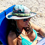 Pic of Sporty American milf Abby Marie loves flashing her big pussy lips on the beach