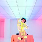 Pic of Mia Valentine looks seductive while posing in neon lingerie and stripping it off