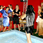 Pic of Kitty Saliery and her opponent remove their bikinis and continue oil wrestling match naked