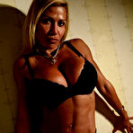 Pic of Stacked muscle blonde Flavia Crisos with bra busting boobs poses in black lingerie