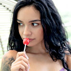 Pic of Dulce Licks a Lollipop