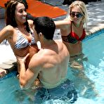 Pic of Bikini-clad babes fucking a big-dicked dude next to the swimming pool - IamXXX.com