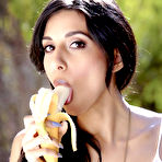 Pic of Denim shorts brunette eating a banana before masturbating outdoors - IamXXX.com