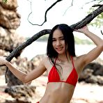 Pic of Mayuko showcases her enticing wet and thin body on the beach