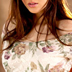 Pic of Shyla Jennings peels off her summer dress by the fire place