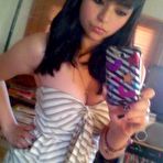 Pic of Sexy amateur honey displaying her round breasts