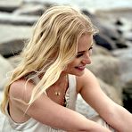 Pic of Emilie De Ravin posing in nature photoshoot