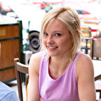 Pic of Glasses-wearing blonde in purple reads magazines and gets naked - aMetart.com