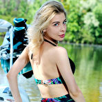 Pic of Eva Tali wriggles out of her bikini and climbs aboard a boat