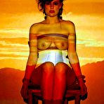 Pic of Dark haired model Sovereign Syre with tied hands demonstrates her body parts