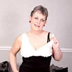 Pic of Naughty older lady playing with her pussy