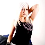 Pic of Inked up chick Elouise takes off her top to show her lovely shapely tits