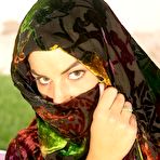 Pic of Indian MILF gets totally naked while changing her clothing on a lawn