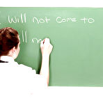 Pic of Busty babe Desirae loosing big pornstar tits from schoolgirl uniform