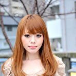 Pic of Hot Japanese girl with red hair Reika Kitahara poses outdoors in a short dress