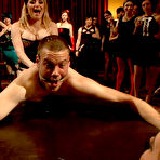 Pic of Male sex slave gets gangbanged by a whole bunch of evil women