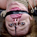 Pic of White girl Darling squirts while being fingered during extreme bondage action