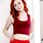 Pic of Sporty redhead Scarlet Skies squirts while being finger fucked after a fuck