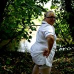 Pic of Obese blonde nurse Lexie Cummings has sex with two men in the woods
