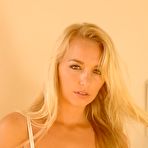 Pic of Blonde girl Hayley Marie Coppin spritzes her hot body while getting naked