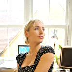 Pic of Blonde British girl Hayley Marie Coppin lets her hair down to start disrobing