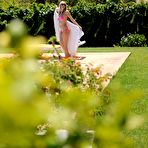 Pic of British amateur Hayley Marie Coppin covers her nice tits in suntan lotion