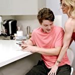 Pic of Dirty blonde Cory Chase seduces a boy while wearing a red dress and glasses